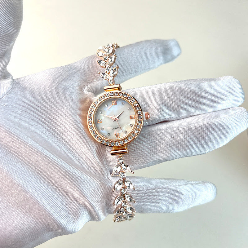 Affordable luxury quartz watch with diamond trim and free adjustable bracelet