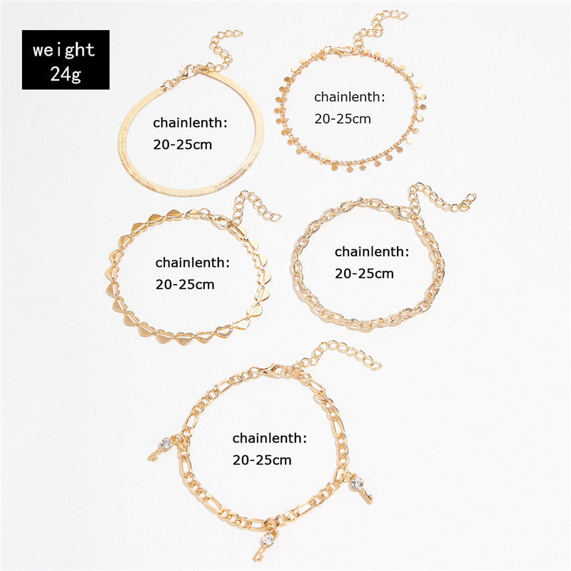 5er Set Goldene Fußketten mit Herz & Schlüssel – Trendige Damen Anklets im eleganten Design