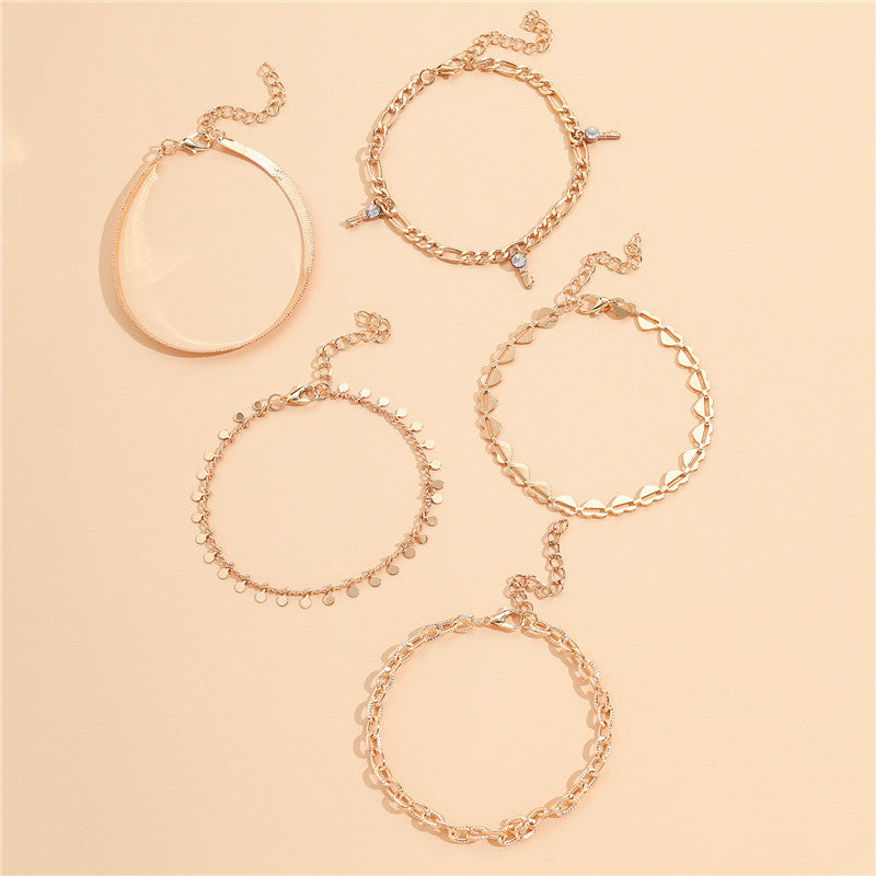 5er Set Goldene Fußketten mit Herz & Schlüssel – Trendige Damen Anklets im eleganten Design