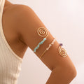 Beaded bracelet with pebble ring opening