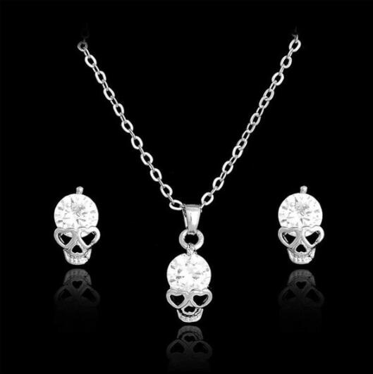Gold-Tone Skull Jewelry Set with Crystals – Edgy Design Necklace & Earrings