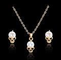Goldfarbenes Totenkopf Schmuckset mit Kristallen – Halskette & Ohrringe im edgy Design