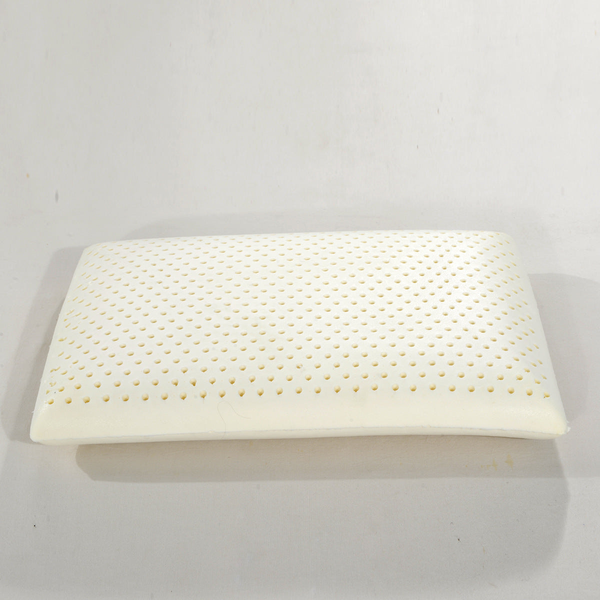 Thai Latex Neck Pillow | Ergonomic Massage Pillow