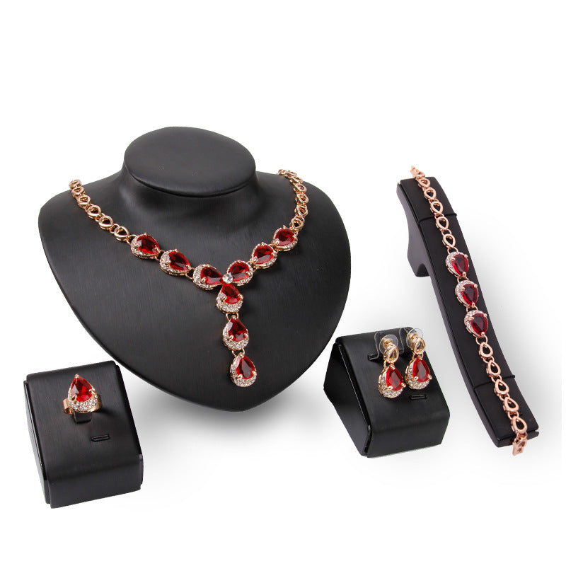 Luxurious Jewelry Set with Red Gemstones – Necklace, Earrings, Bracelet & Ring