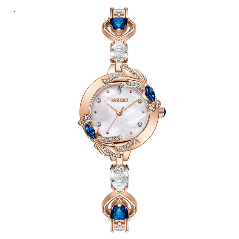 Schlichtes, vielseitig kombinierbares Damenarmband mit kleinem Goldfisch- und Fritillaria-Anhänger