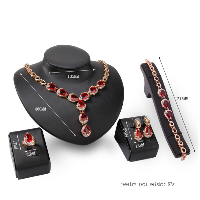 Luxurious Jewelry Set with Red Gemstones – Necklace, Earrings, Bracelet & Ring