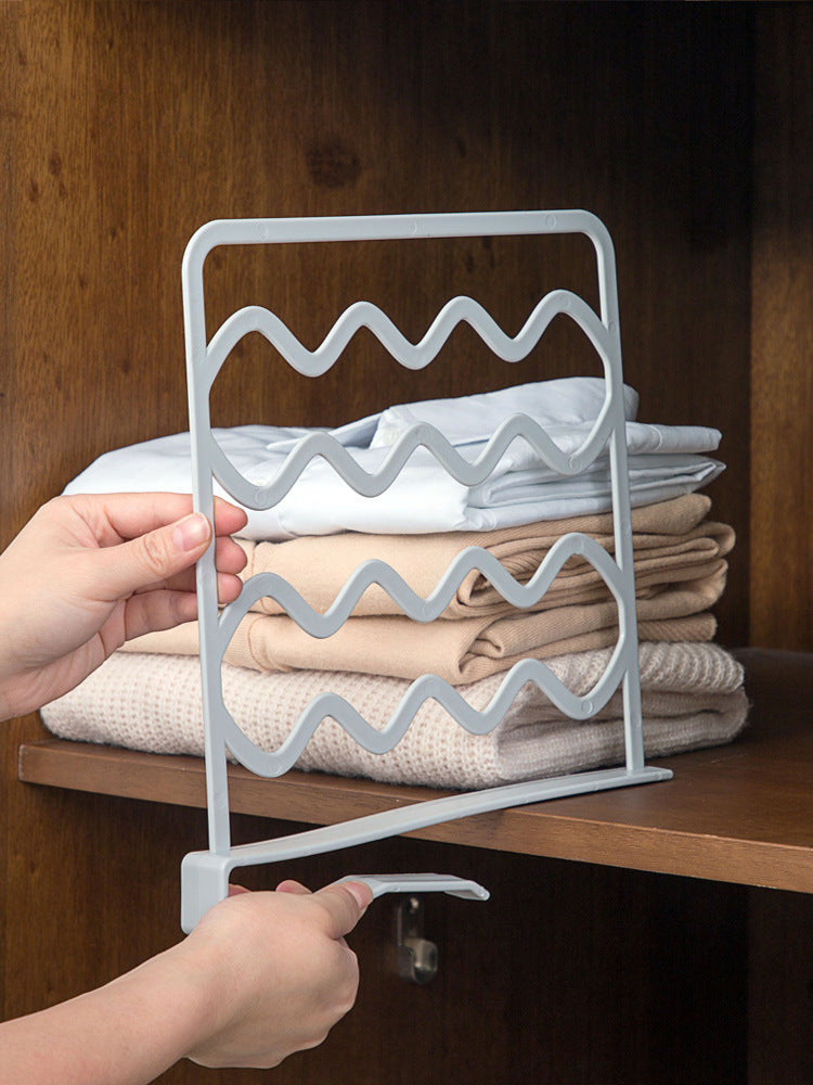 Pull-out, adjustable, space-saving cabinet organizer