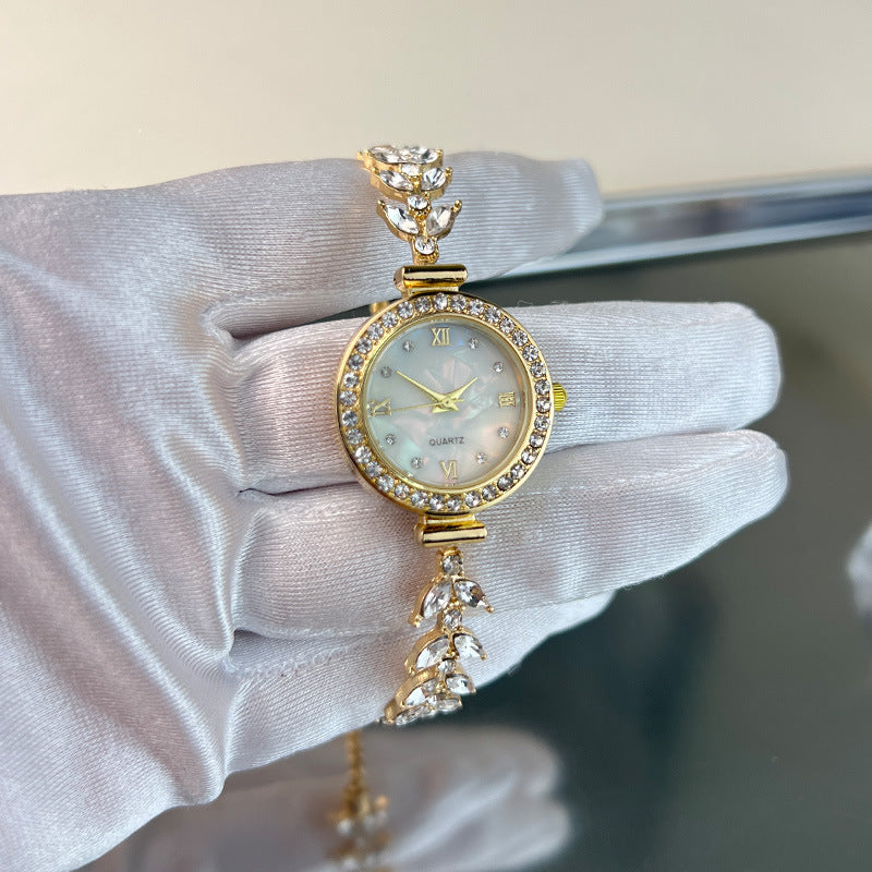 Affordable luxury quartz watch with diamond trim and free adjustable bracelet