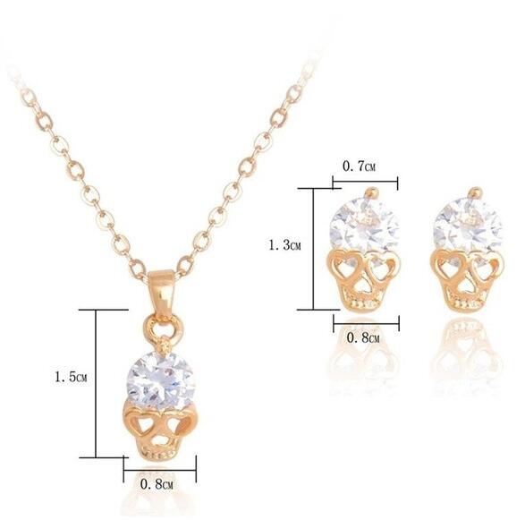 Goldfarbenes Totenkopf Schmuckset mit Kristallen – Halskette & Ohrringe im edgy Design