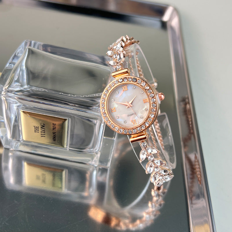 Affordable luxury quartz watch with diamond trim and free adjustable bracelet