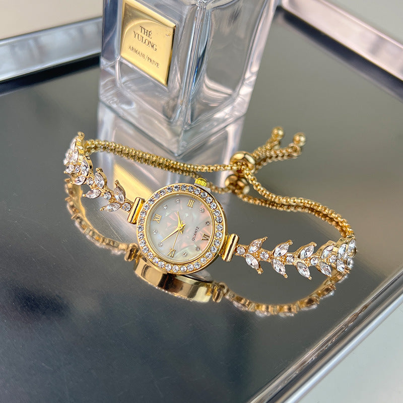 Affordable luxury quartz watch with diamond trim and free adjustable bracelet