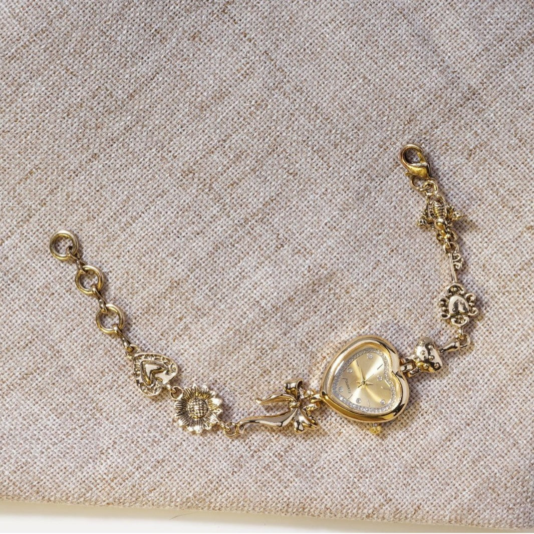 Women's Vintage Heart Jewelry Watch – Gold Bow & Floral Design