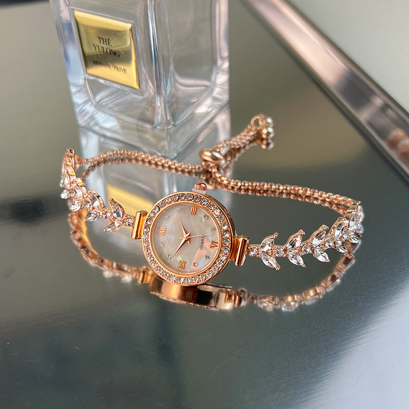 Affordable luxury quartz watch with diamond trim and free adjustable bracelet