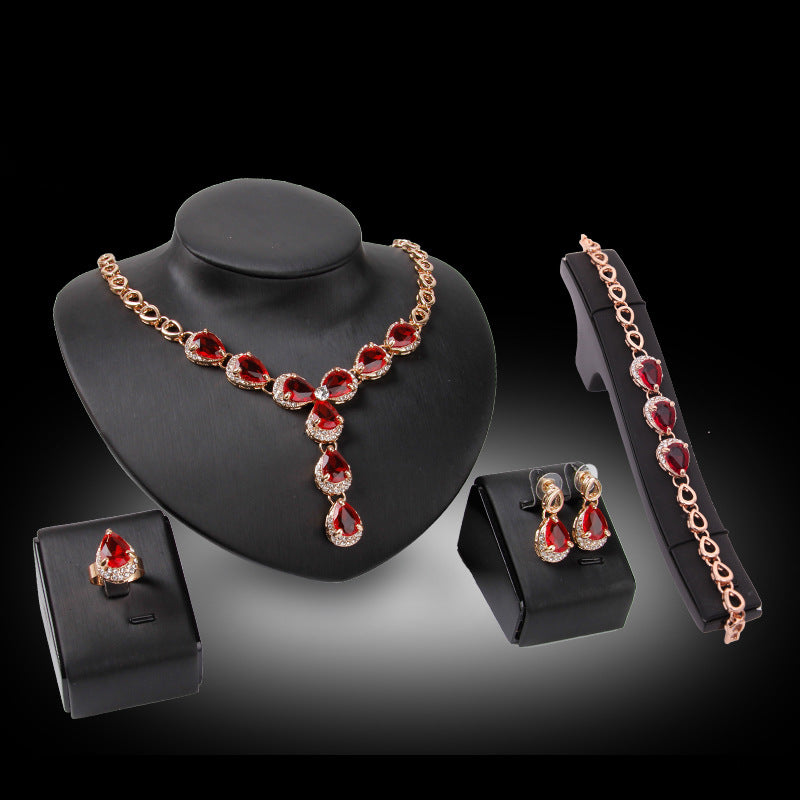 Luxurious Jewelry Set with Red Gemstones – Necklace, Earrings, Bracelet & Ring